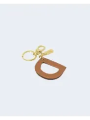 Goldene Schlüsselanhänger mit Leder-Anhänger