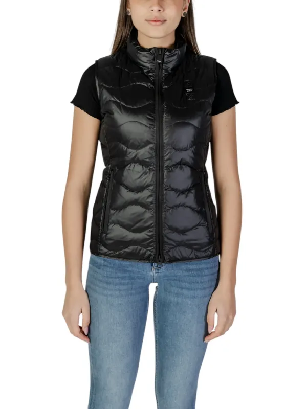 Schwarze Damen Pufferweste mit Jeans