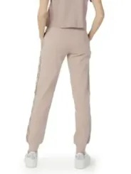 Helle Jogginghose mit goldenem Reißverschluss