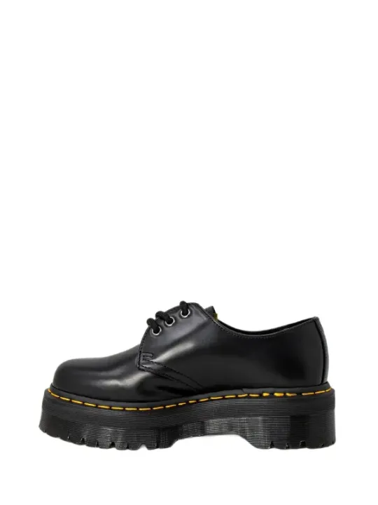 Schwarze Lederstiefel mit gelber Naht